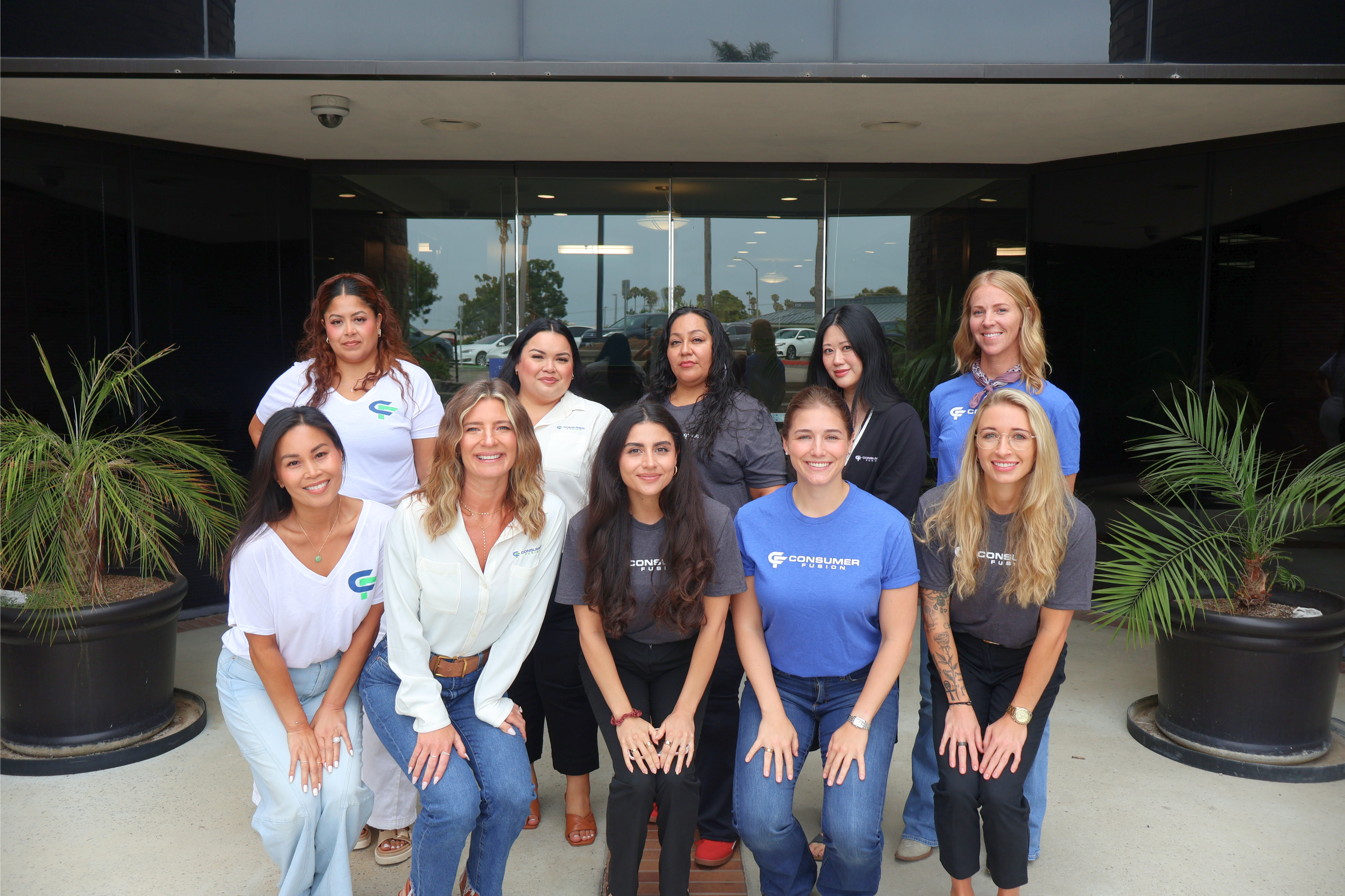 The Consumer Fusion account management team outside the company office